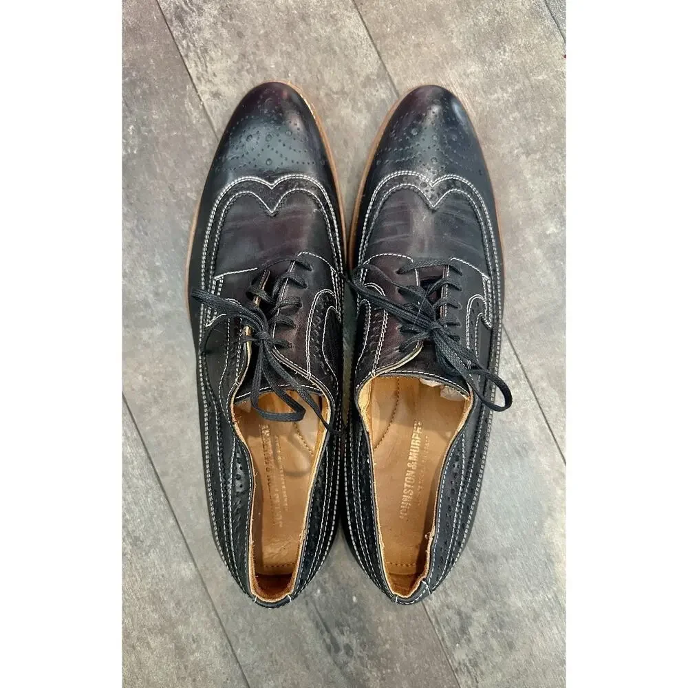 Johnston & Murphy Mens Conrad Wingtip Black Leather Oxford Shoes.